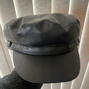 Black faux leather cap
